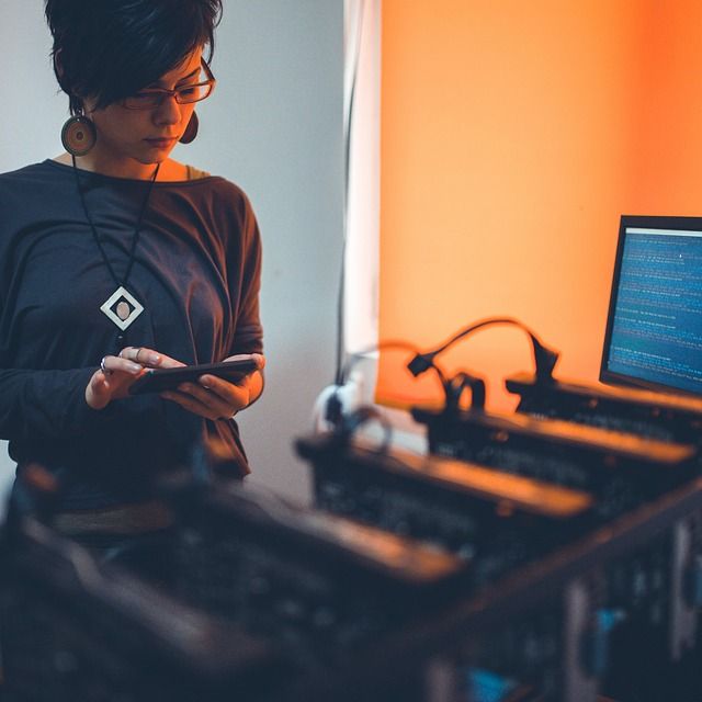 An abstract image showing a colourful cloud forming a ring